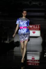 Model walks the ramp for Manish Arora Show Garnd Finale at Wills Lifestyle India Fashion Week 2013 Day 5 in Mumbai on 17th March.JPG